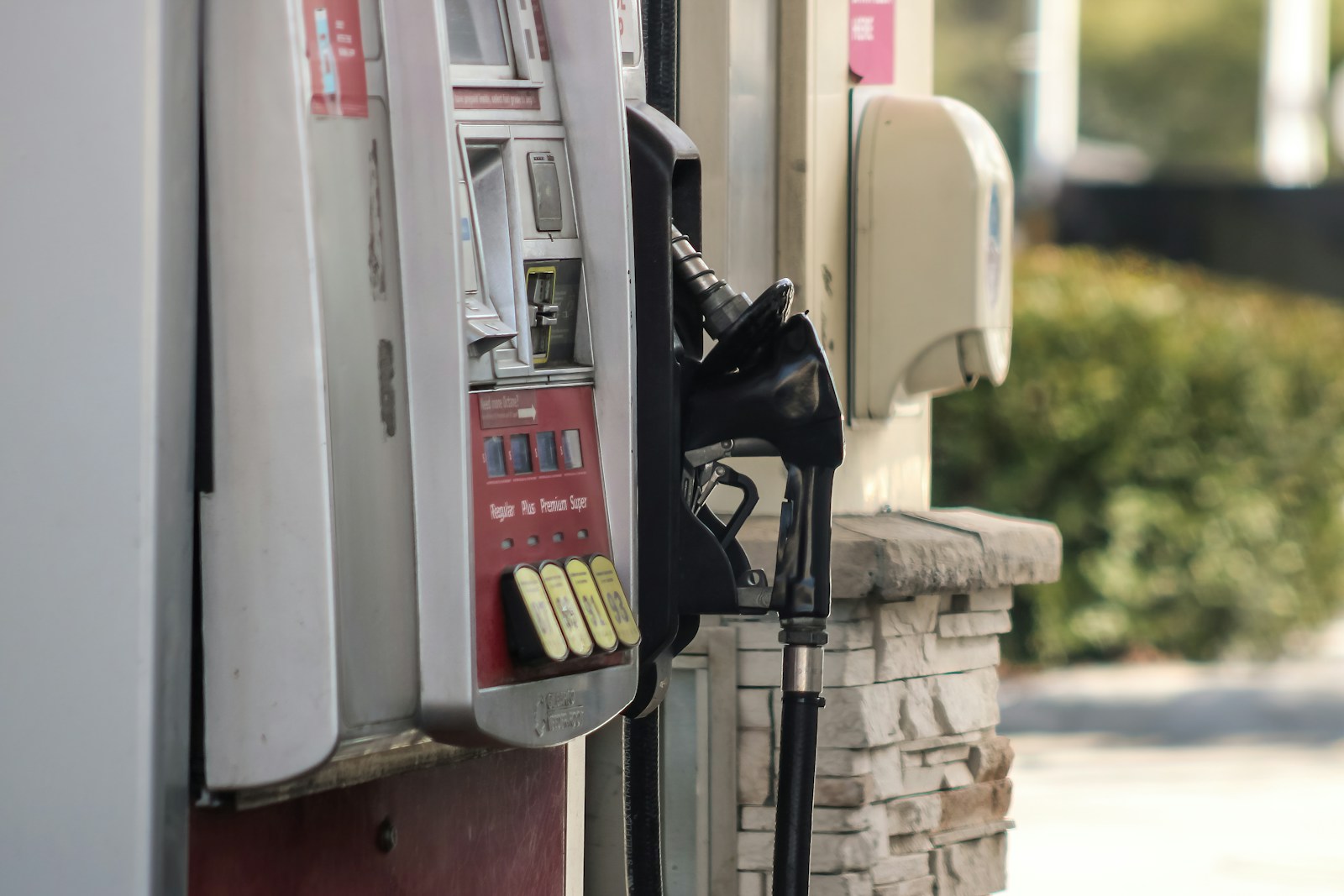 Photo by Dawn McDonald a gas pump next to a brick wall